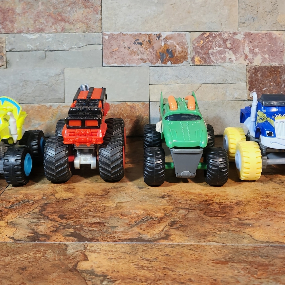 4-Lot Monster Trucks Between 3-4 Inches Long.